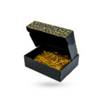 black mailer boxes with gold foil